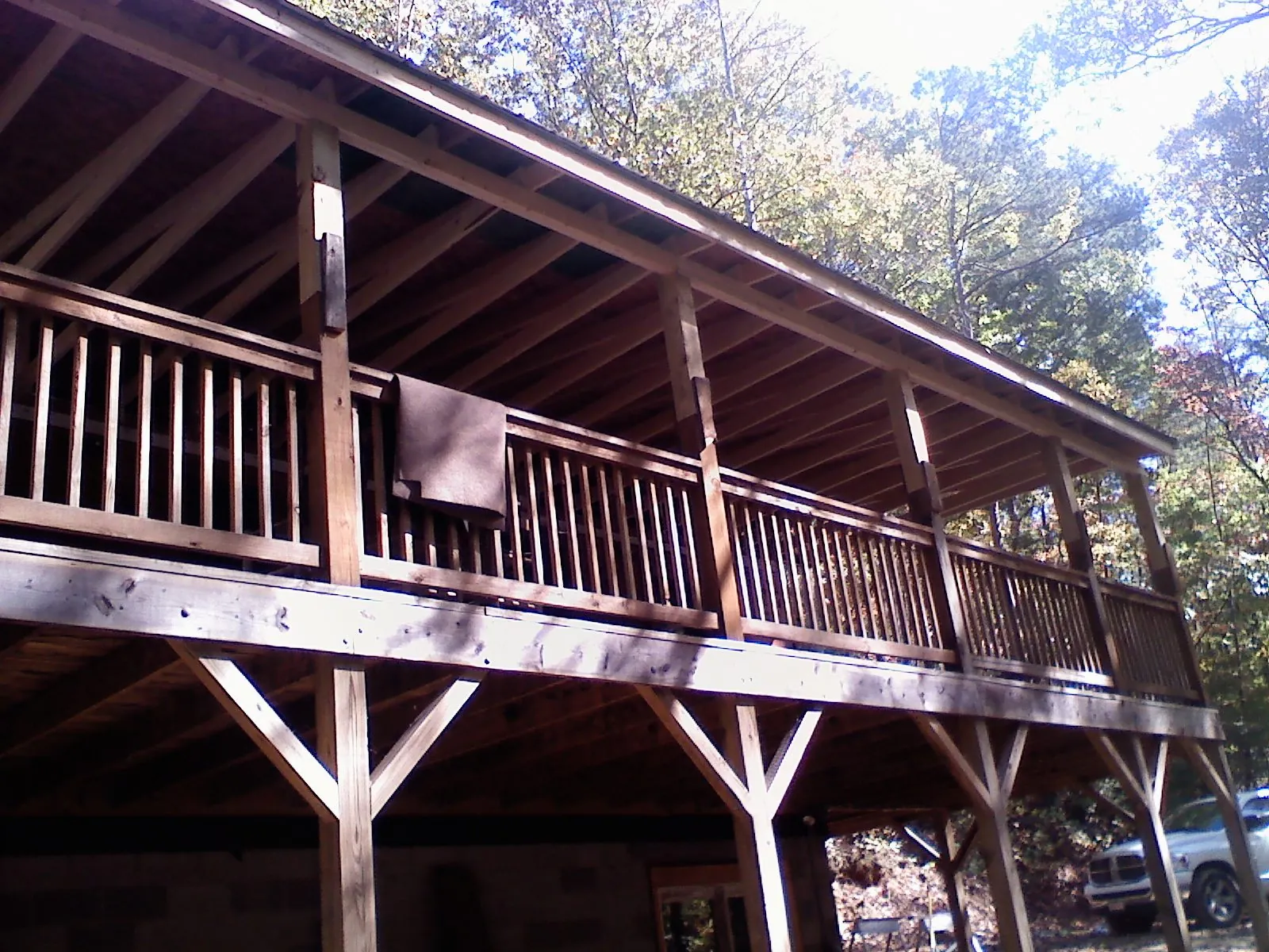 Timber framing under a new elevated porch and deck — Roof Leak Repair in New Castle by Roofing Brothers